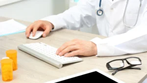 Provider entering a tendon sheath injection claim for CPT code 20550 at a clinic workstation