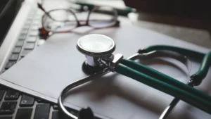 Podiatry biller reviewing coding documentation for ICD-10 code L84 corns and callosities