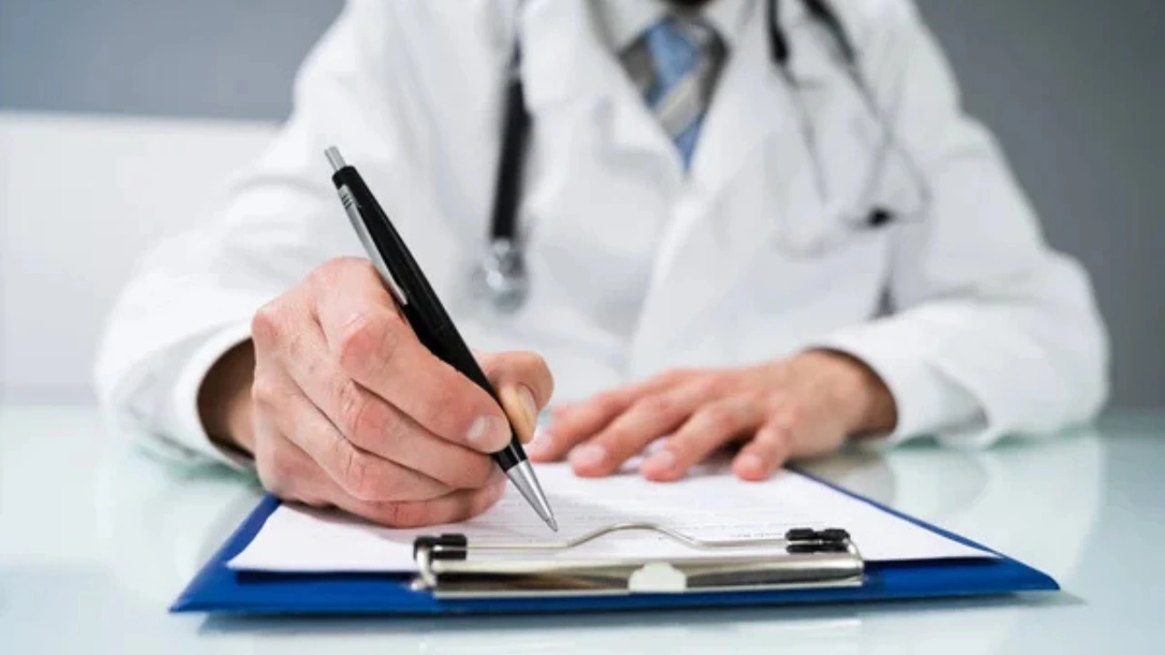 Podiatrist performing nail debridement on a patient foot, billed under CPT code 11721