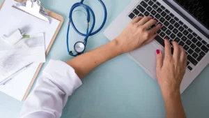 Podiatrist examining an ingrown toenail coded as ICD-10 L60.0
